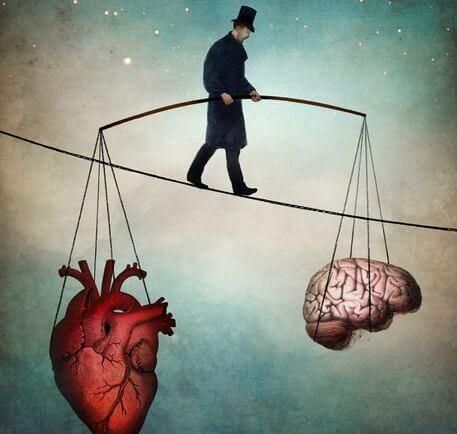 Человек балансирует на веревке между мозгом и сердцем.