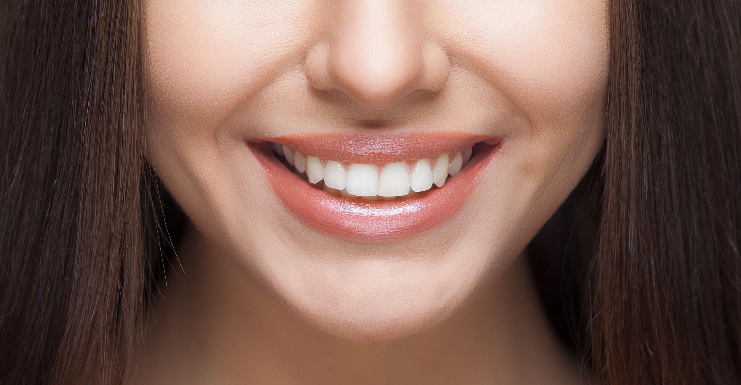 склеивание улучшит форму ваших зубов