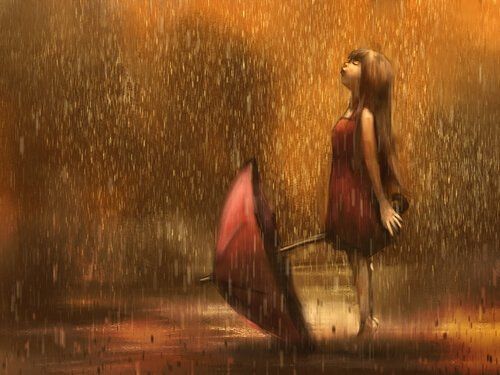 Девушка с зонтиком под дождем.