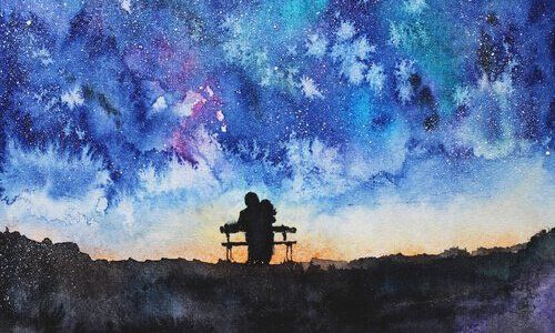 Пара на скамейке и звездное небо.